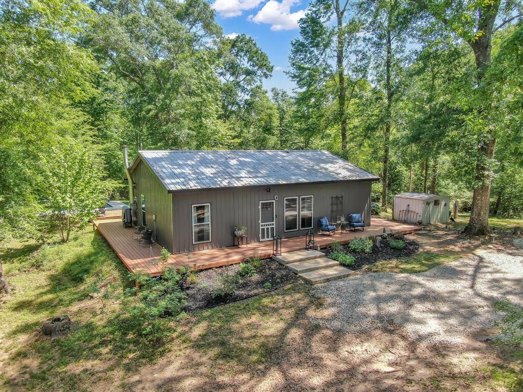 Thoughtful wraparound deck, metal roof and spray foam ensures decades of low cost and easy maintenance