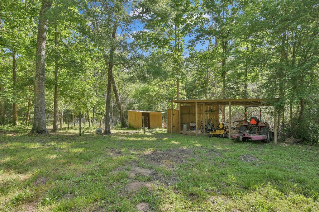 Additional covered parking for equipment and vehicles. A great place to store hay as well.