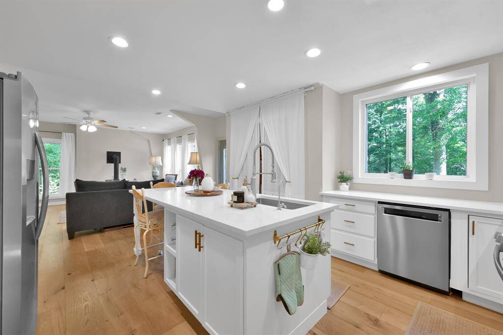 Kitchen is open to family room. Walk-in panty pictured on far side of kitchen