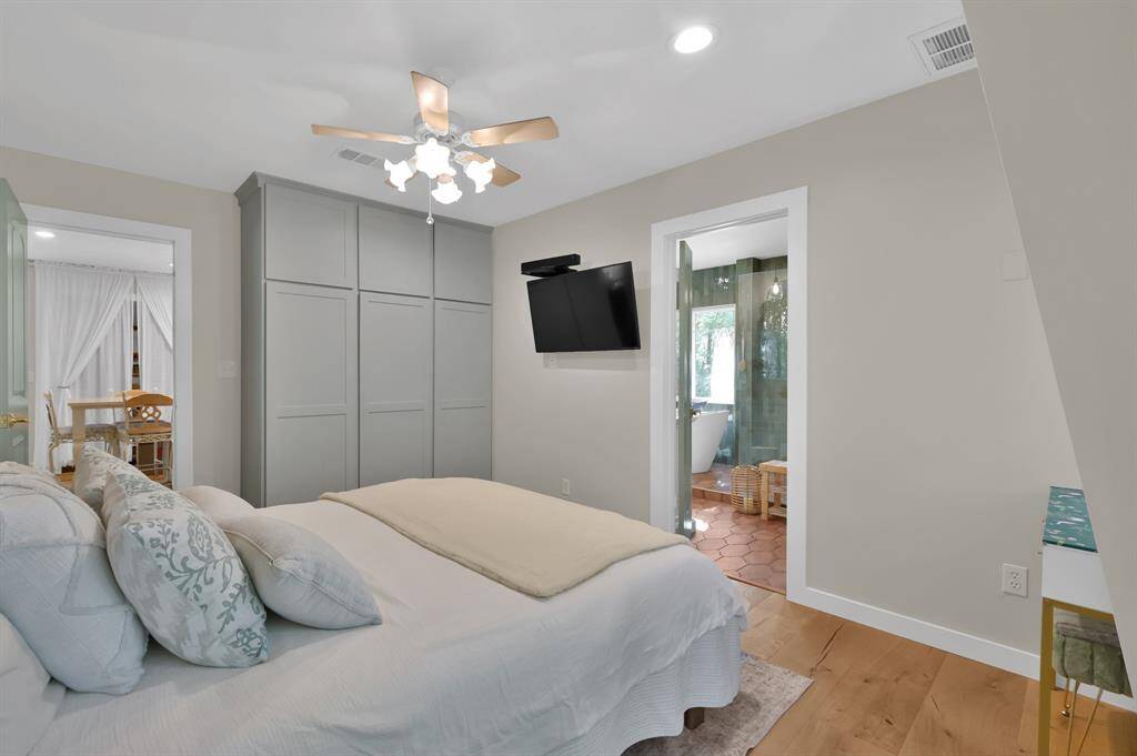 Master suite offers custom built-ins