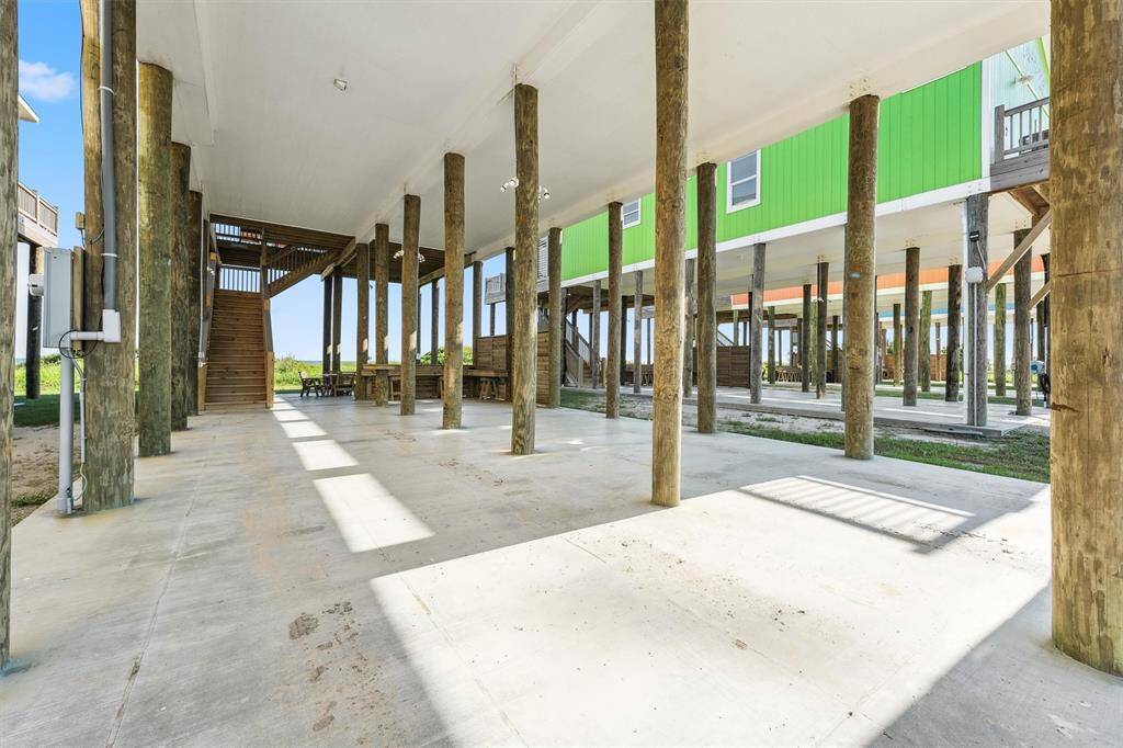 Gather with friends or family under the home’s shaded patio, complete with picnic-style seating and peaceful views.