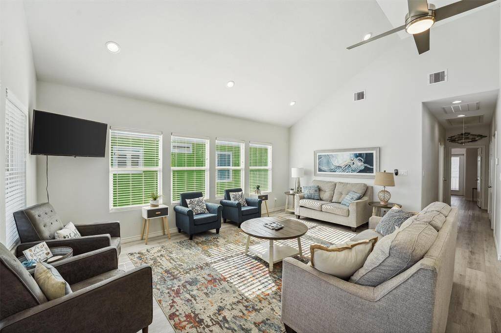 The open-concept design blends living and kitchen areas seamlessly, making it easy to entertain or relax with the whole crew.