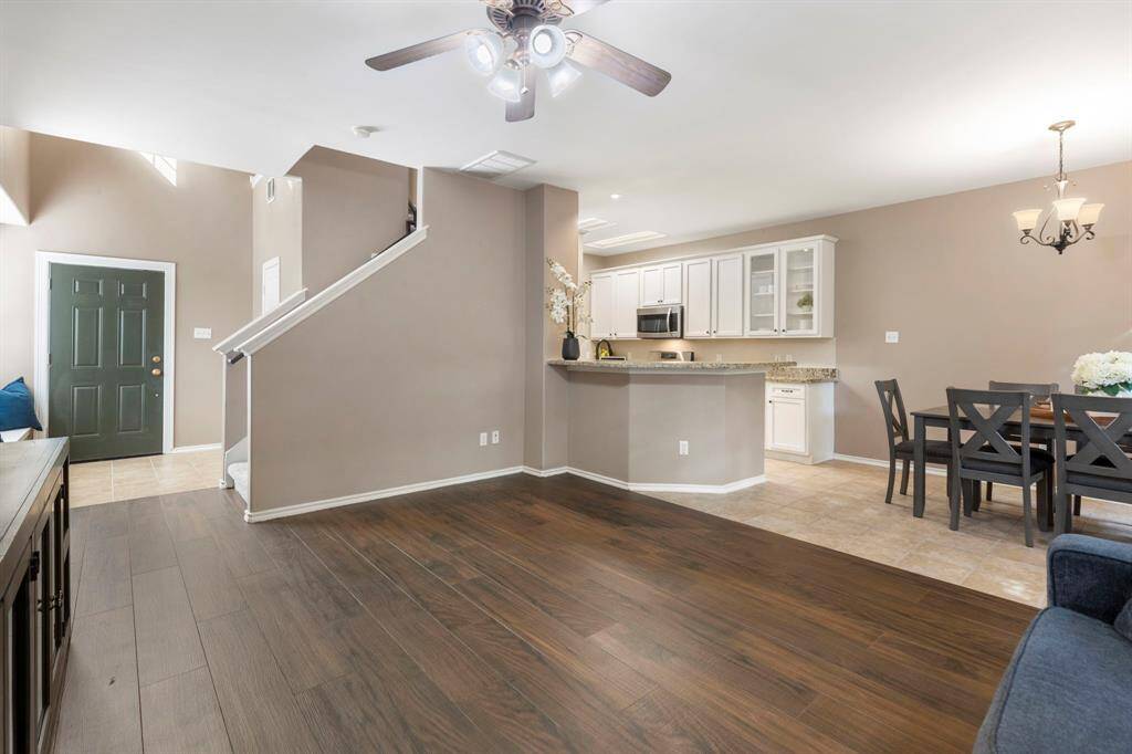 You’ll love the open floor plan, featuring a cozy breakfast nook and a clear view of the kitchen, making it easy to stay connected.