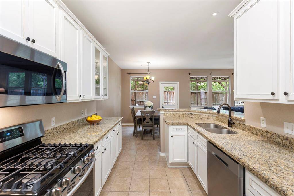 Take in the beautiful outside views while preparing meals in this spacious kitchen.