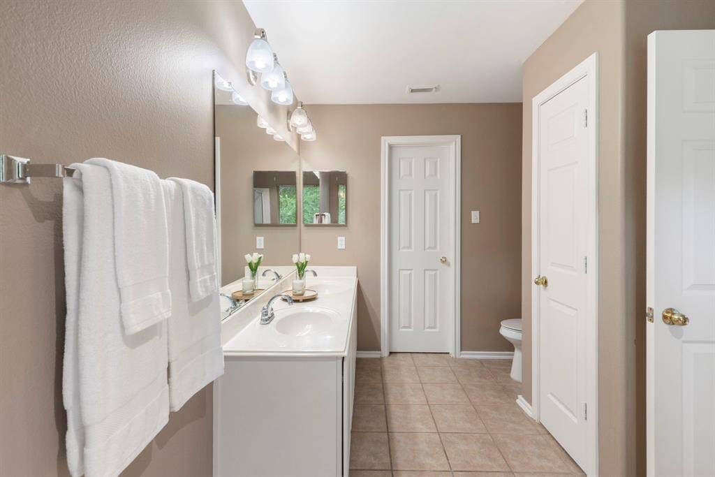 Nice-sized linen closet in the primary bath, offering convenient storage for towels and essentials.