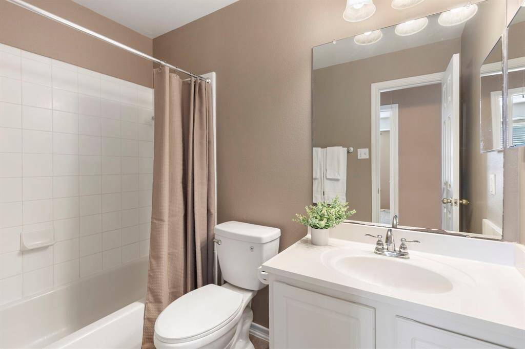 The secondary full bathroom is located upstairs, offering convenience and comfort for everyday living.