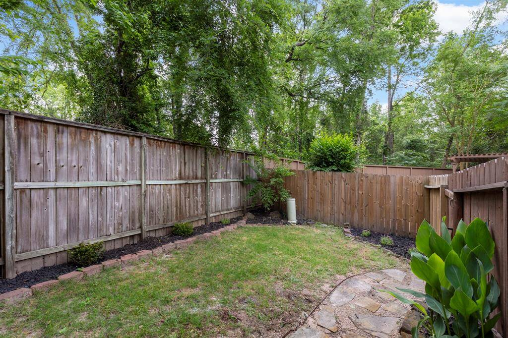 Even with the expansive deck and covered patio, there's still plenty of yard space left for play.