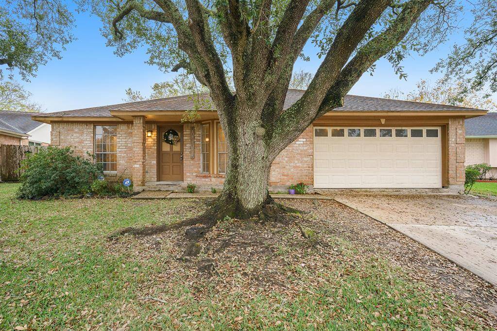 Charming single-story brick home with a large front yard and mature tree. Features a welcoming entrance, two-car garage, and well-maintained landscaping. Ideal for comfortable family living.