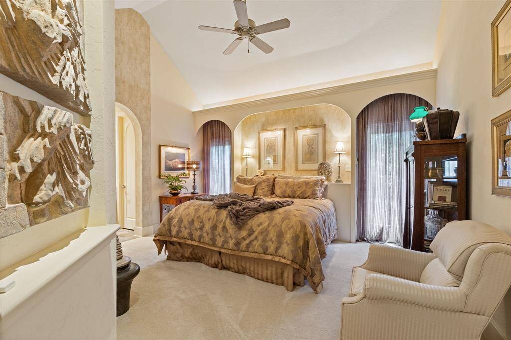 Experience luxury in the second owner's suite with private climate control and a spacious sitting area overlooking the pool and backyard. Perfect place for great conversations with your guests!