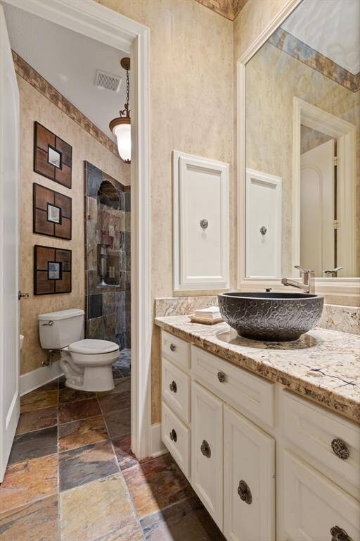 Luxurious second suite with new plush carpet (2023) and stunning views of the landscaped backyard.