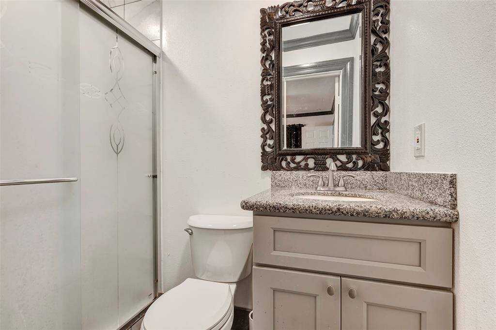 Full bathroom inside primary bedroom in the apartment.