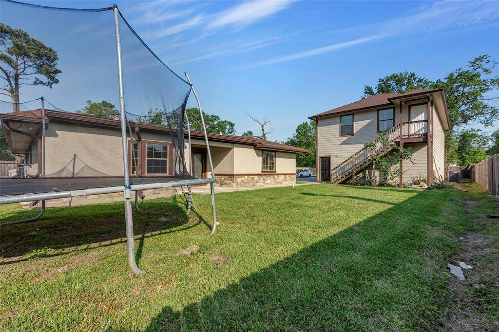 Generous backyard perfect for entertaining with view of 3 the bedroom apartment.