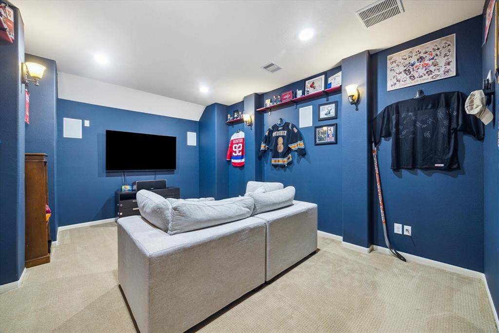 In addition to the game room is the media room with built in speakers.
