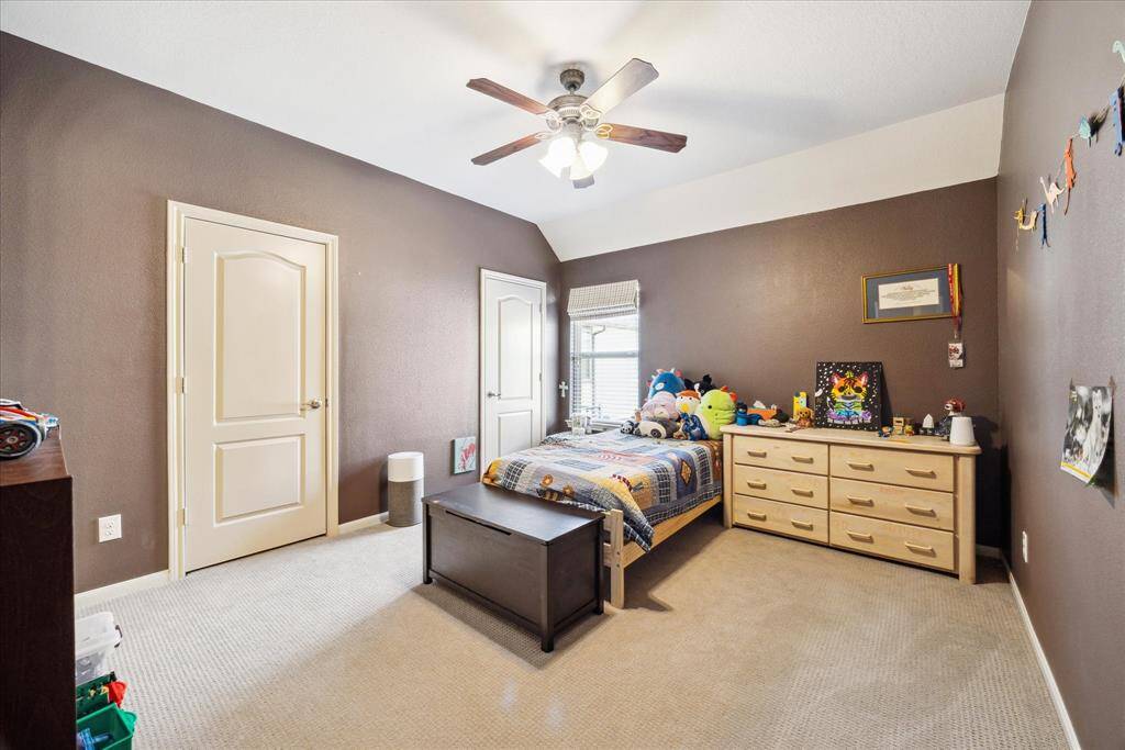 Another guest bedroom with generous closet space and access to the jack and jill bath.
