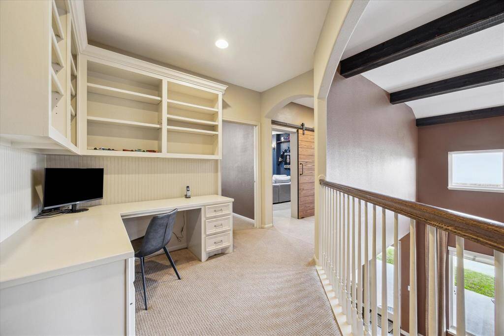 The second floor also has a convenient work station situated between all of the bedrooms.