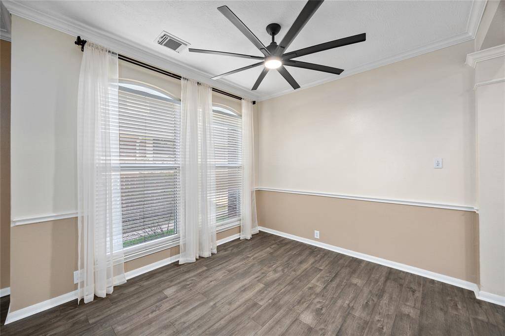 Formal Dining area is also bright with natural lighting pouring in from these great size windows!