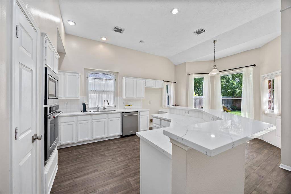 Kitchen Island is a great place for your guest to gather...as well as offering extra prep-space to cook those family meals!