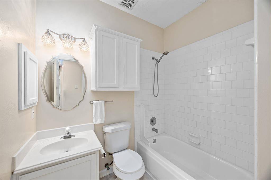 Secondary full bathroom #1 is downstairs and right across from the downstairs Bedroom.