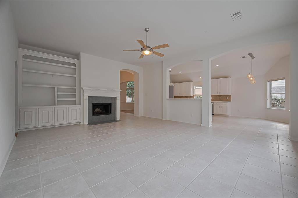 Open floorplan connecting the kitchen with the den.