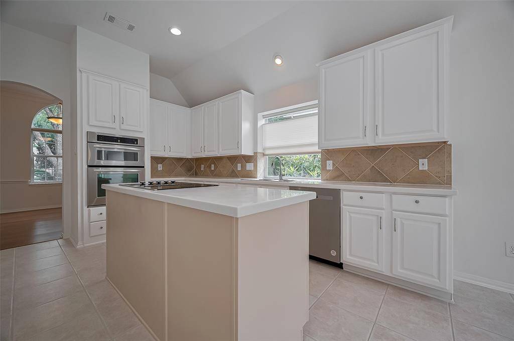 Well appointed kitchen with lots of cabinet storage and great island.
