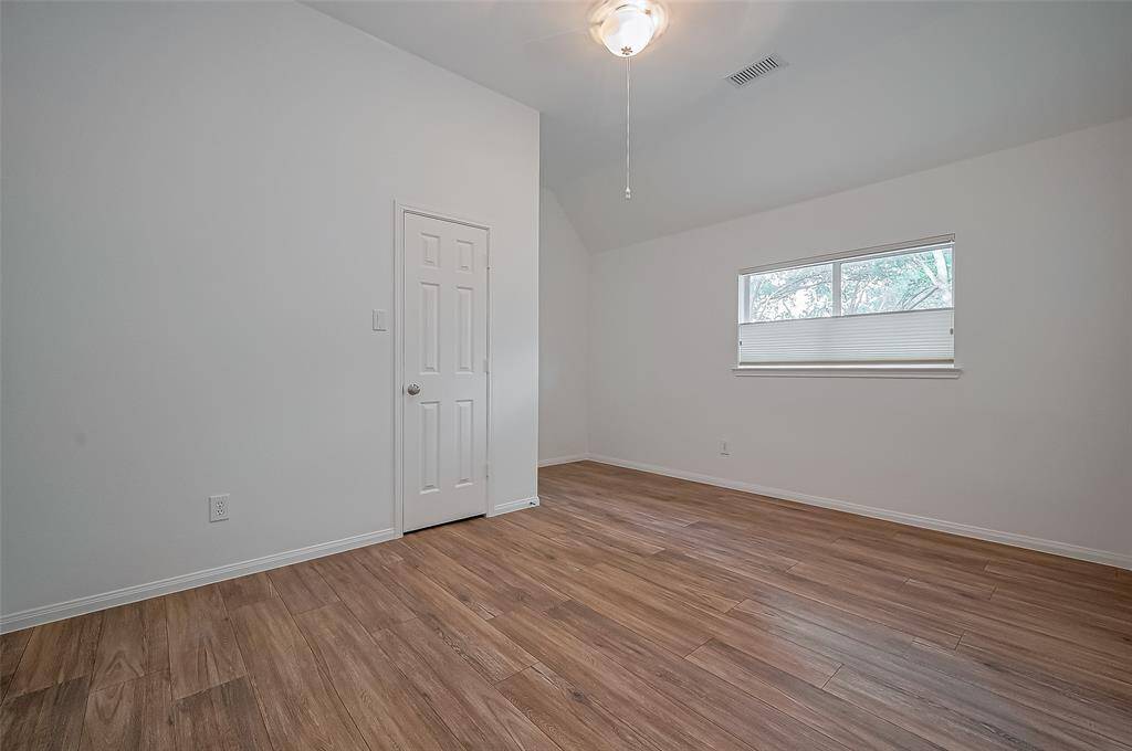 Secondary bedroom 2 offers plenty of space, privacy, high ceilings and a walk-in closet.