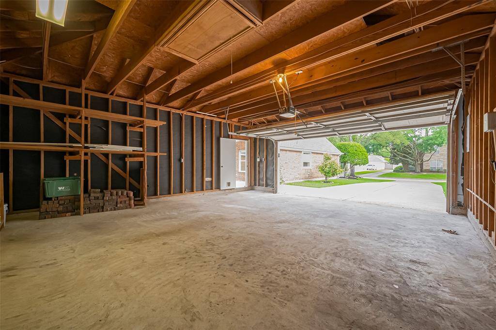 Garage comes equipped with a loft for extra storage.