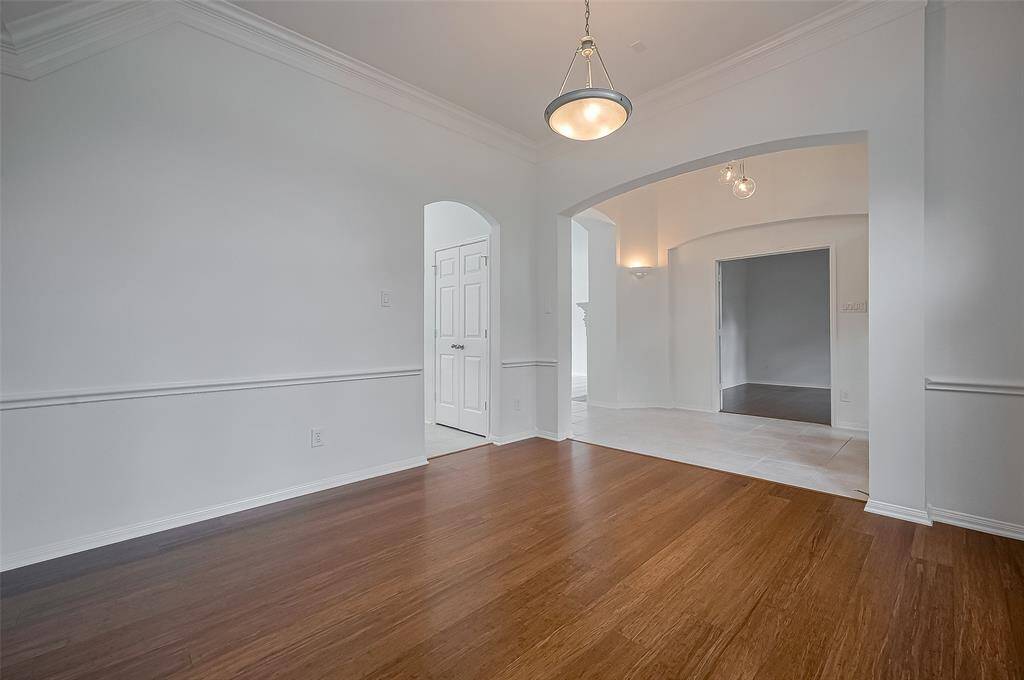 Formal dining has plenty of natural light.