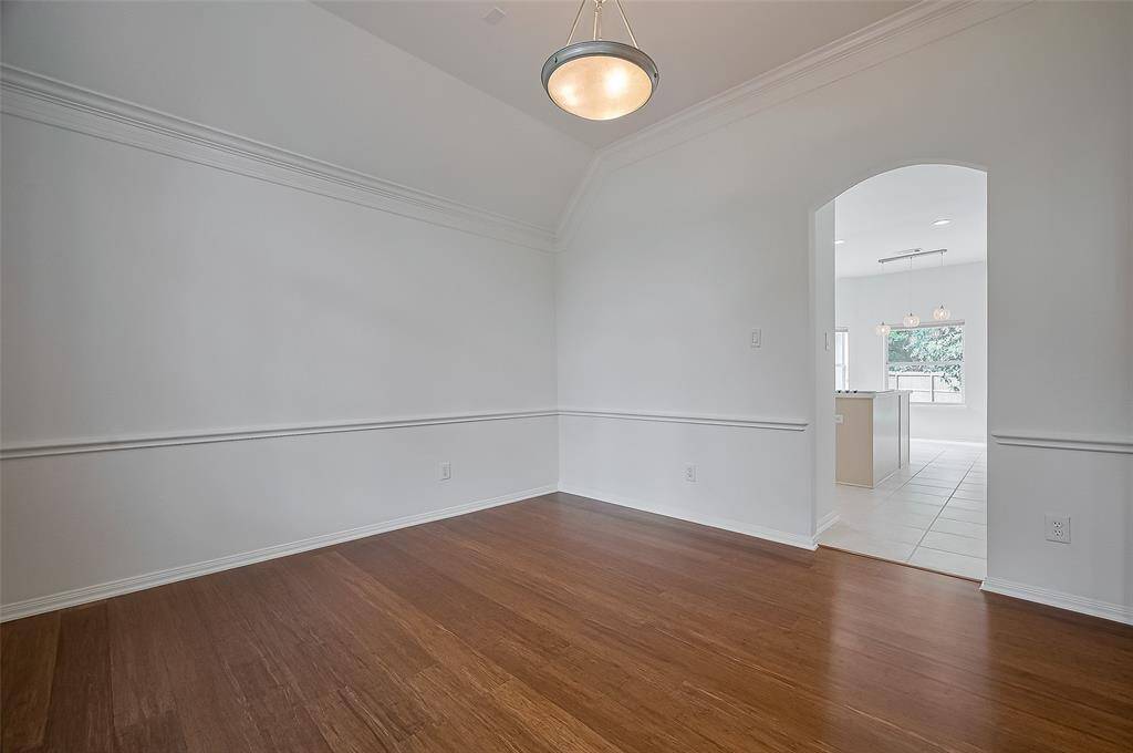 Formal dining is directly connected to kitchen/foyer.