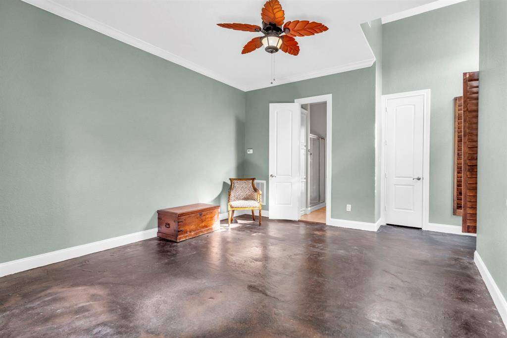 Welcome to the casita! Enter into a light-filled room with polished concrete floors, crown molding and direct access to its own full bath—ideal as a private guest retreat, in-law suite, or studio.