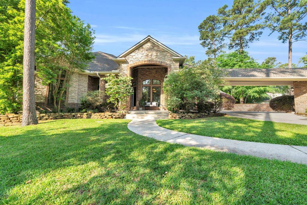The estate’s stone-and-brick façade, porte-cochère, lush landscape, and resort-style pool, glow in perfect harmony—an elegant conclusion to a home that offers lake-area living at its finest. From the private casita and gourmet kitchen to the grand entertaining spaces inside and out, every detail invites relaxation, connection, and celebration. All that’s left is for you to call it home!