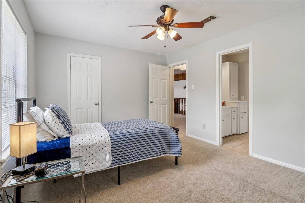 A view out to the game room and into the shared bath.