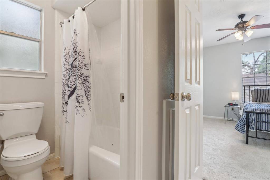 Shared bath water closet with tub shower can be closed off from the sink area.