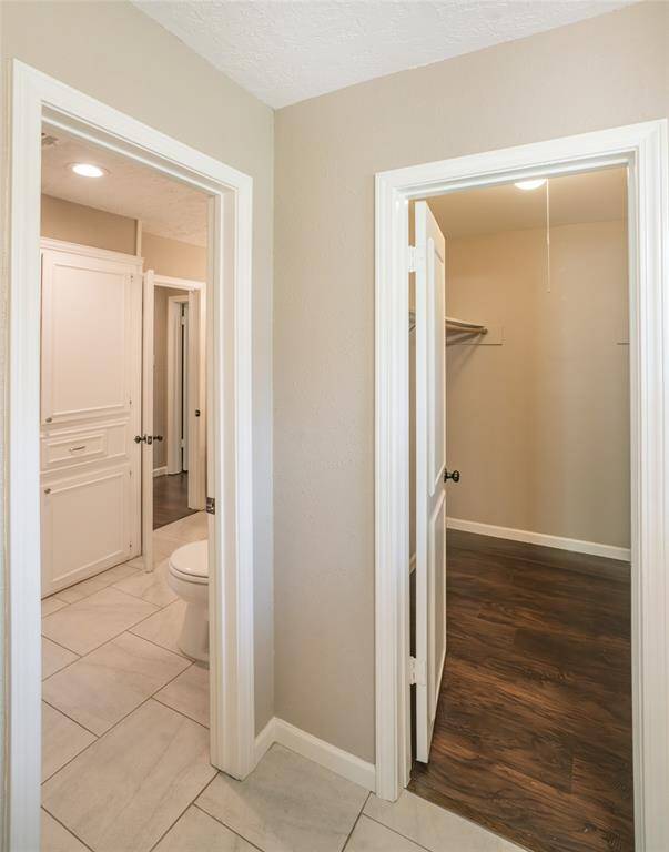 Separate Dressing Area And Another Walk -In Closet Off Guest Bedroom