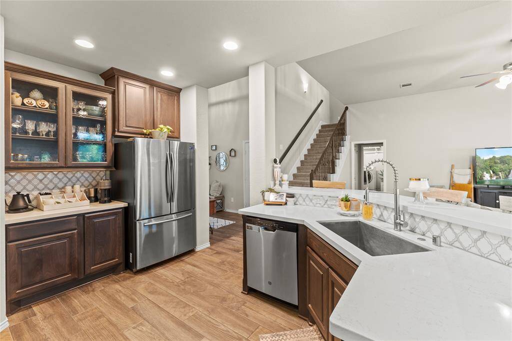 The kitchen is open to the family room.