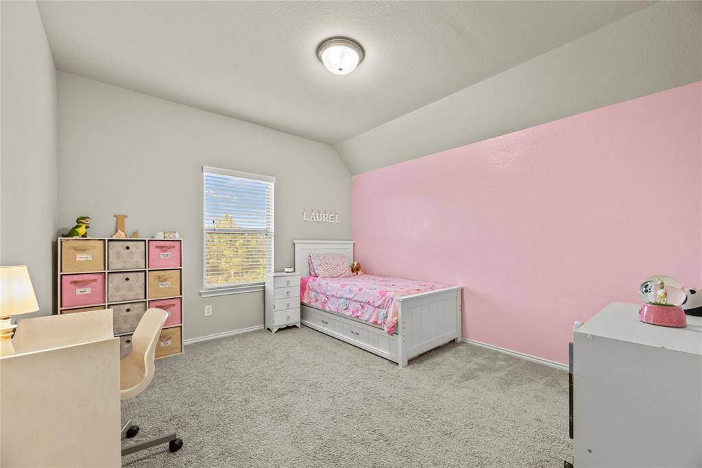 Upstairs secondary bedroom.