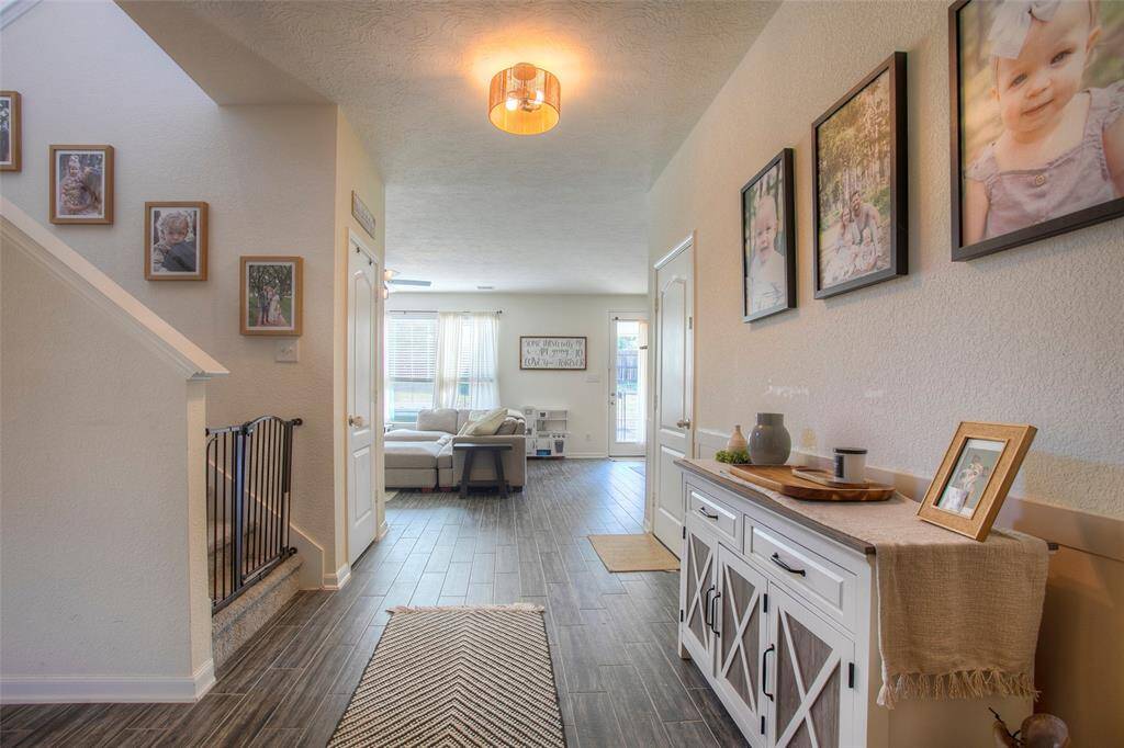 This immaculately maintained 3-bedroom, 2.5-bath KB Home offers a thoughtful, functional layout with flexible space that adapts to your lifestyle—whether you need a home office, game room, or media space.
