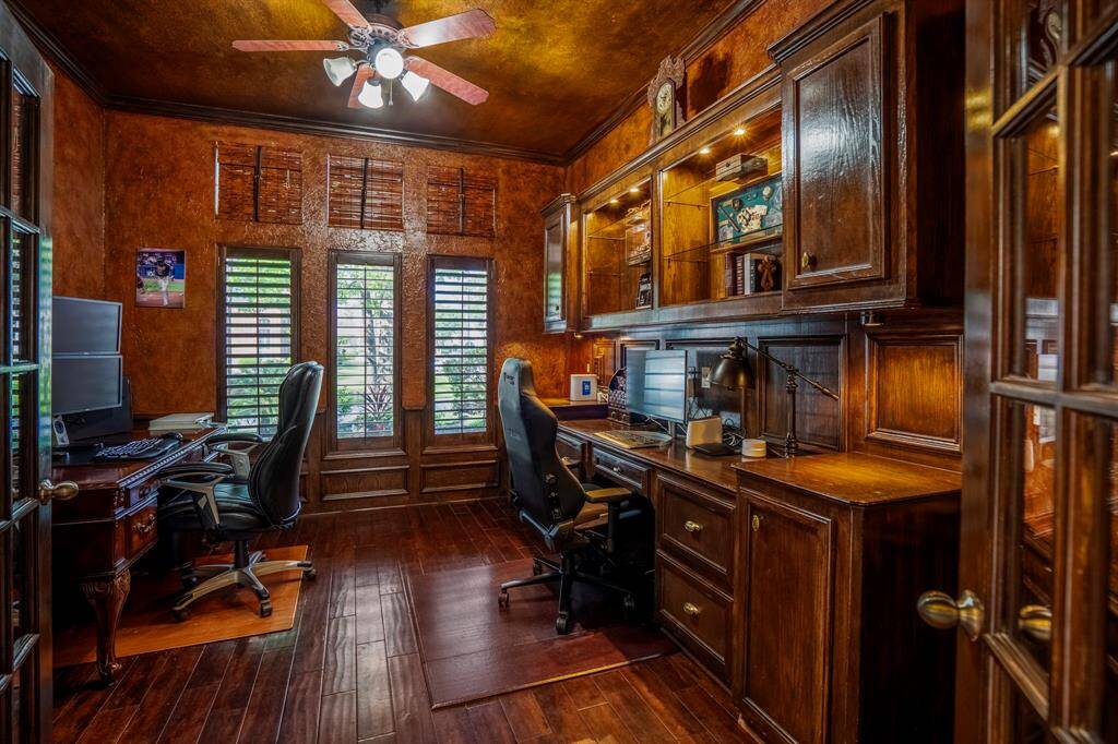 First-floor office just off the entry tucked behind french doors