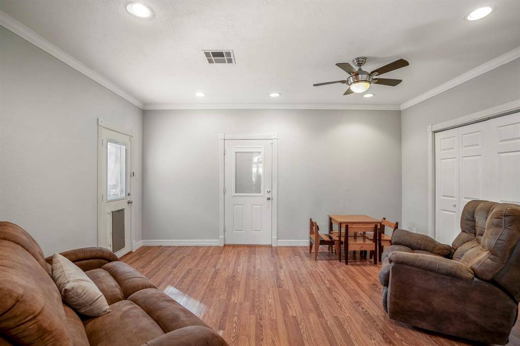 Bonus/flex room on the first floor that includes a massive closet and through that door is another patio in the backyard. This could easily serve as a secondary bedroom.