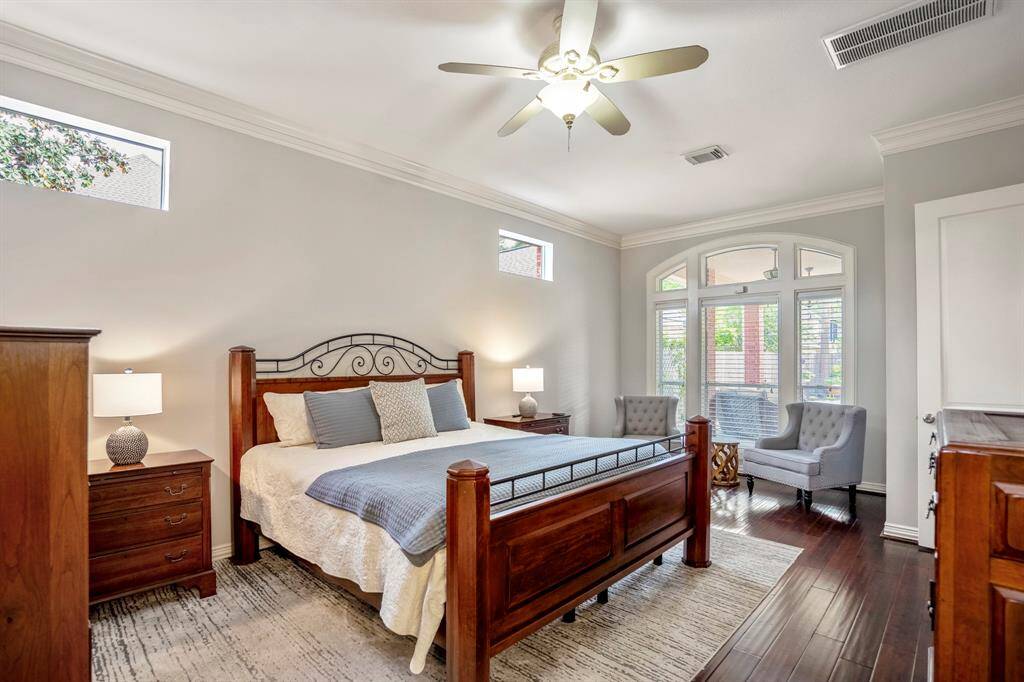 Primary suite includes space for a separate seating area or reading nook