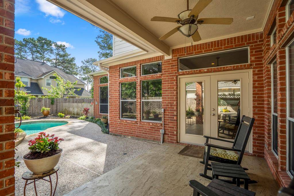 Expansive covered patio overlooking the pool