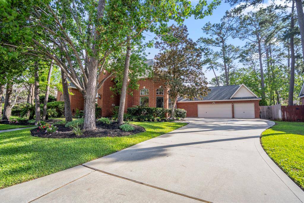 Admiring the 3-car garage and ample parking space....