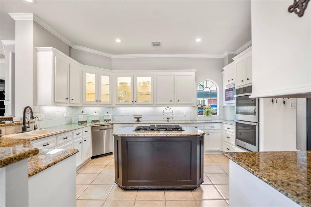 Plentiful storage with all these cabinets & a chef's dream preparation space