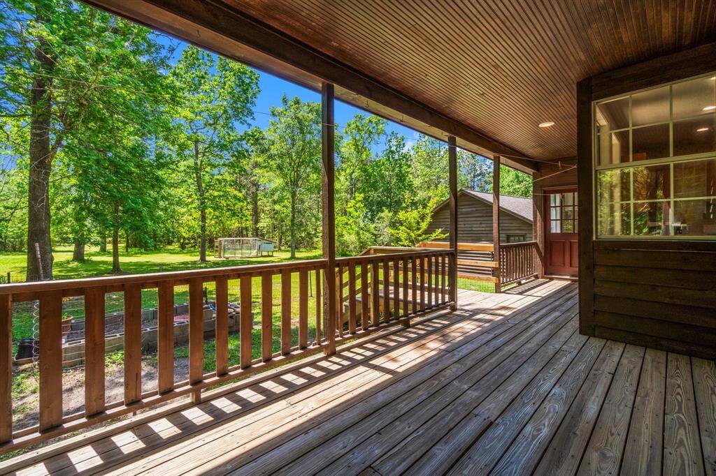 Covered rear porch is perfect for watching wildlife.