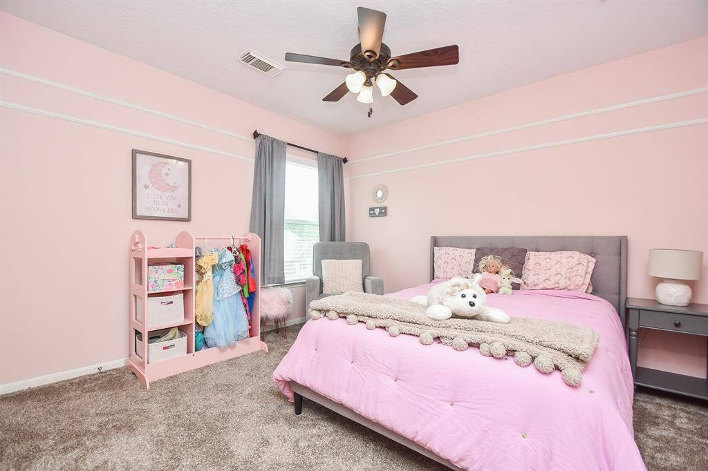 Bedroom #4 measures 11' x 10' and also complete with large window, ceiling fan, and plush carpet. It can make the perfect guest room for your friends and family visiting from out of town or an in-law suite.