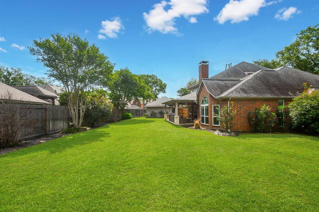 Plenty of green space to add in swingset and trampoline and to kick around a soccer ball with your little ones or play fetch with your fur babies.