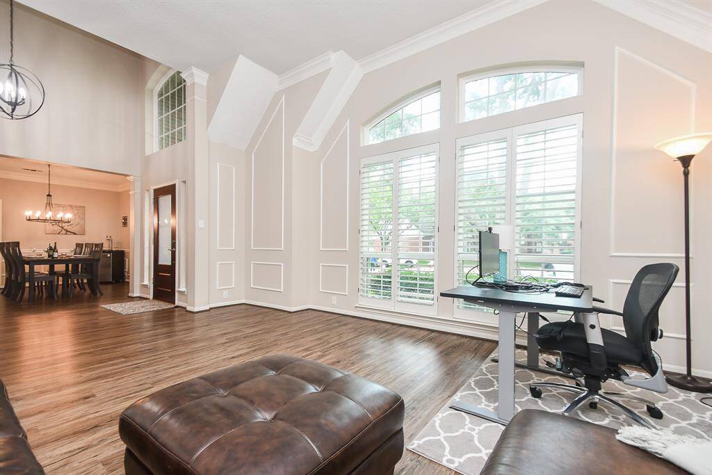 Immediately to your left is your spacious home office/study measuring 14' x 15'. Enjoy working in tranquility as you sip your cup of coffee and look out your huge windows that provide panoramic views of your front yard.