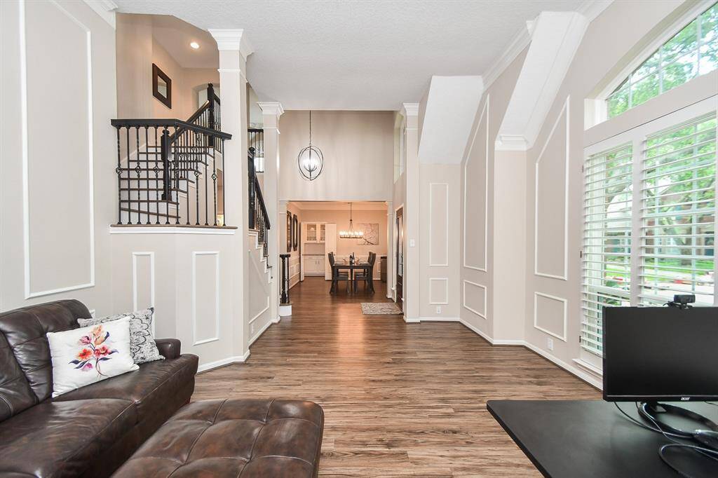 Note the beautiful architectural details of crown molding and trim work throughout your home!