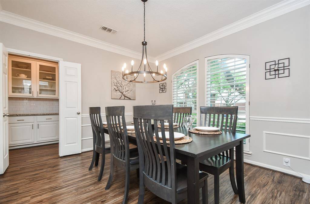 Measuring 12' x 12', your dining room comfortably sits 8. Hosting for the holidays has never been better with your dining room's easy access to your butler's pantry and kitchen!