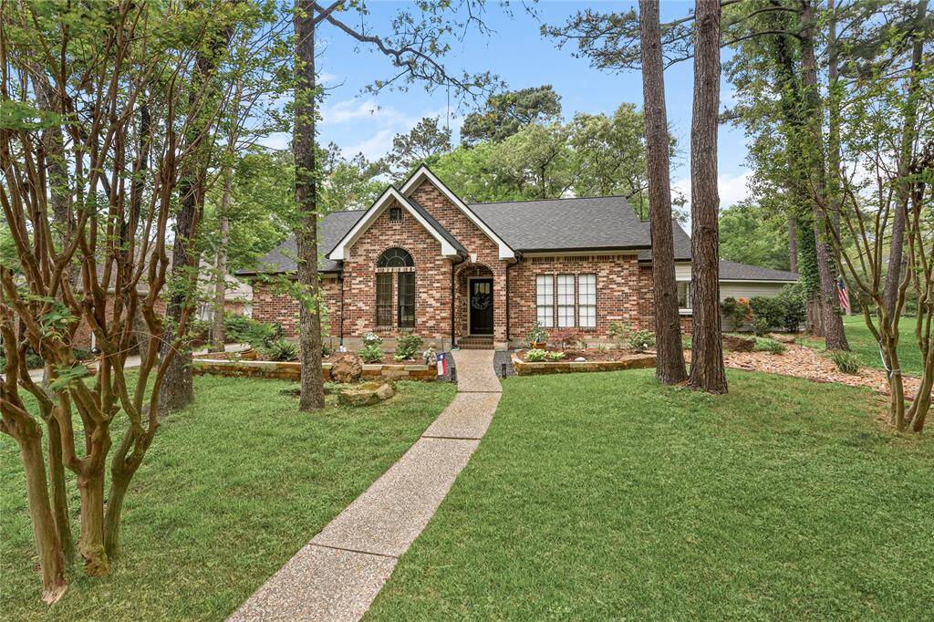 This house has tons of curb appeal. The flowerbeds are nicely landscaped, and the exterior of the house is in excellent condition. The front porch is large and welcoming. Overall, this is a lovely property that looks like a great place to live.