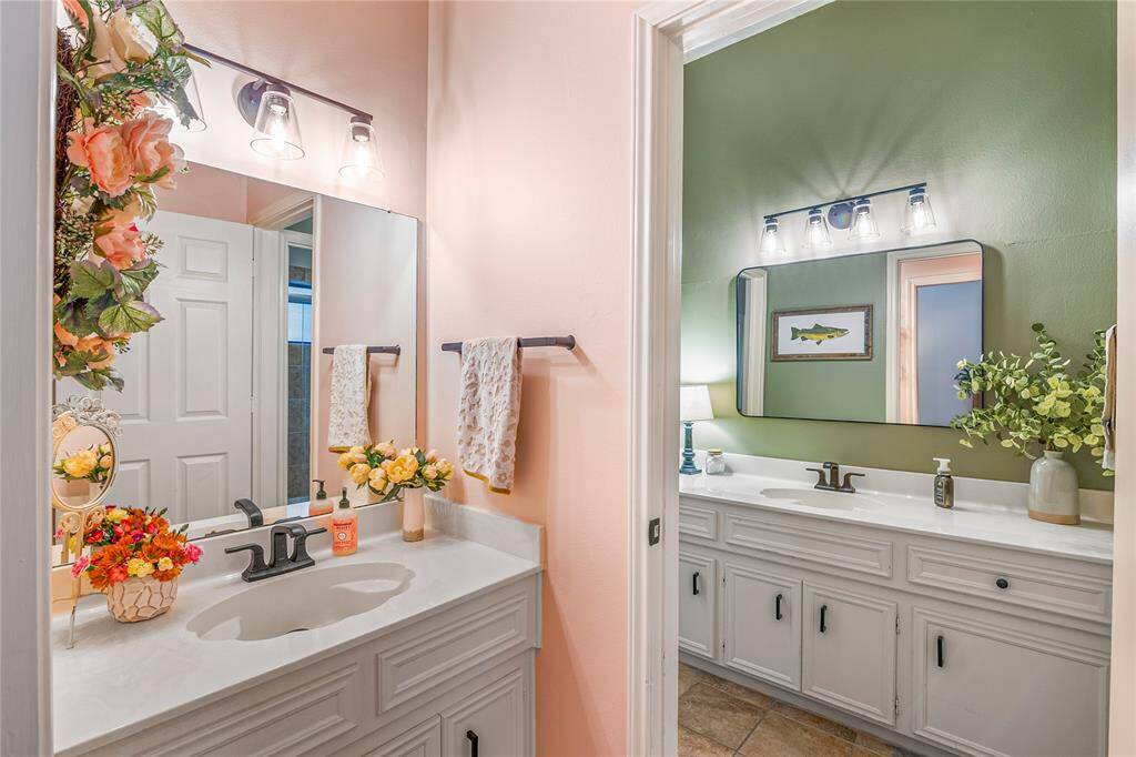 Attached to the second bath is a separate sink with quartz counter.